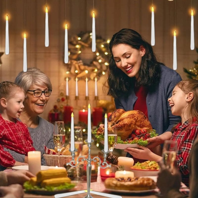 festin familial bien entouré au décor chaleureux par des bougie flottante LED beauté et sans danger