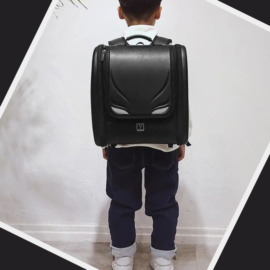 cartable-enfant-sac-a-dos-orthopédique-a-roulettes-cuirette-noire-modele-mystérieux