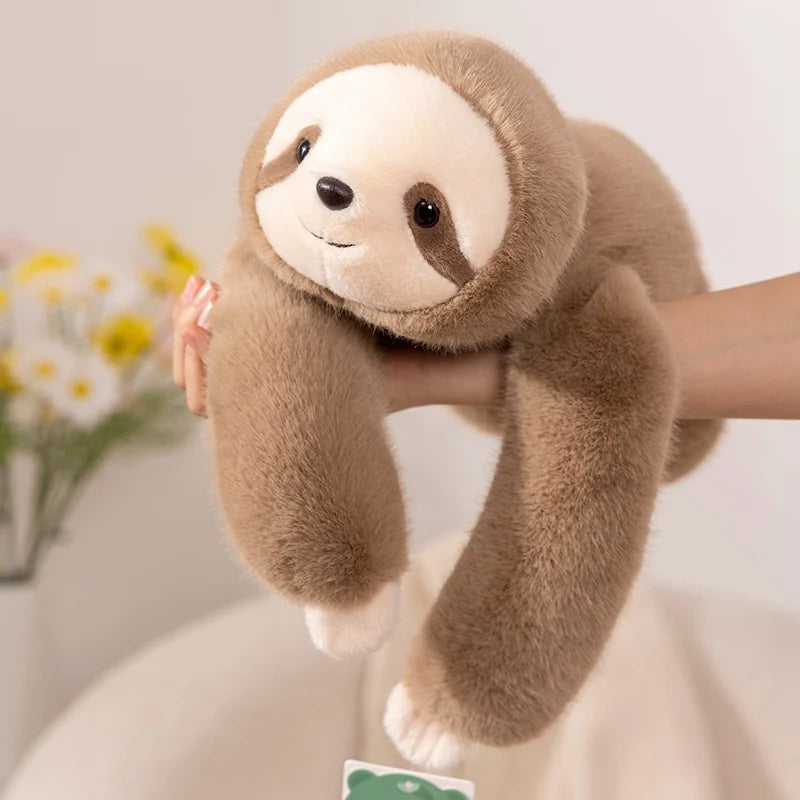 peluche lestée le grand paresseux aux longs bras lourds
