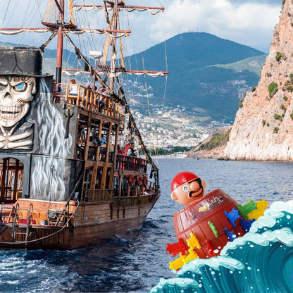 un vieux bateau pirate a jeté le baril du vieux Pirate en mer pour que le jeu enfant 3 ans débute
