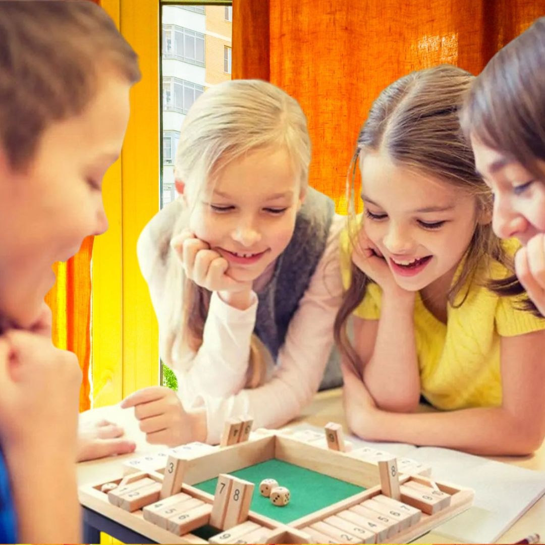 4 jeunes de 10 ans jouent aux jeux de société famille populairela compétition est saine