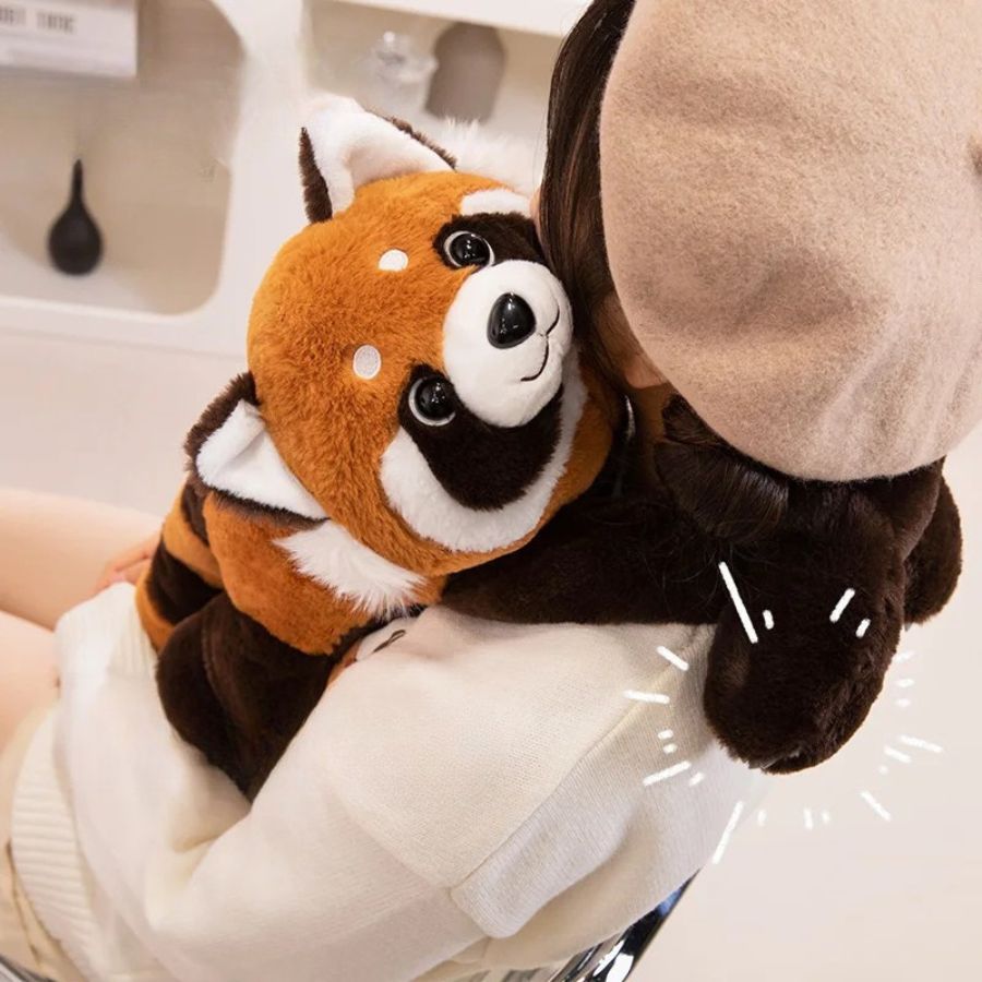une adolescente utilise la peluche lestée raton laveur thérapeutique 