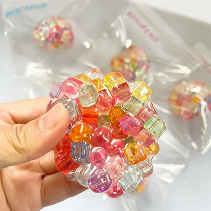 balle anti-stress multicolore avec perles cubiques