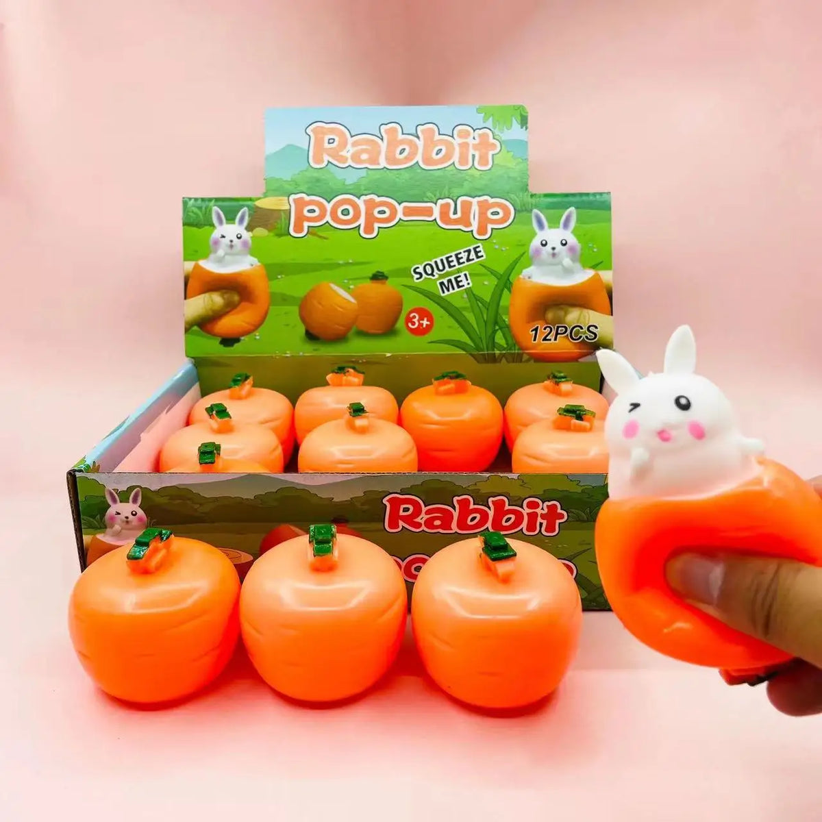 balle anti stress pour enfant de 3 ans et plus en forme de carotte cachant un lapin dedans PAQUES