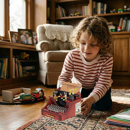 boite a musique enfant en forme de machine a écrire ancienne avec mouvement