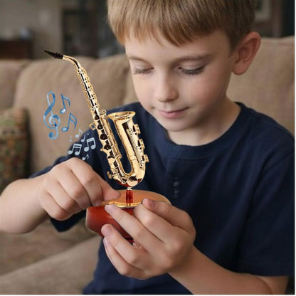 boite a musique enfant saxophone modèle réduit fascinant