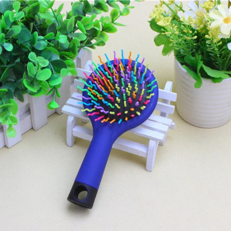 brosse à cheveux manche bleu brosse arc-en-ciel magique