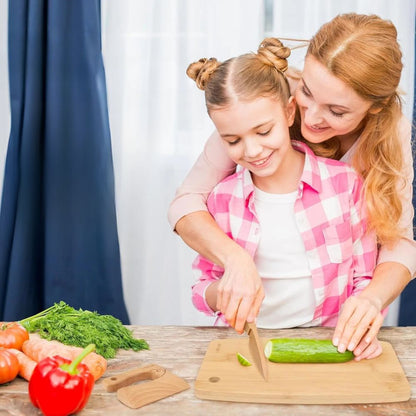 cuisiner avec sa fille en harmonie sans craindre de se couper avec le bon couteau enfant en bois.