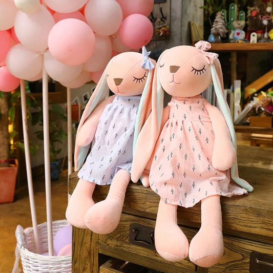 doudou-lapin-rose-robe-mauve-ou-rose