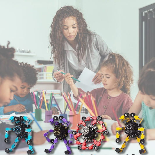 fidget spinner bleu, violet, rouge et jaune utilisés dans la classe de Mme Sophie pour outil anti stress et concentration