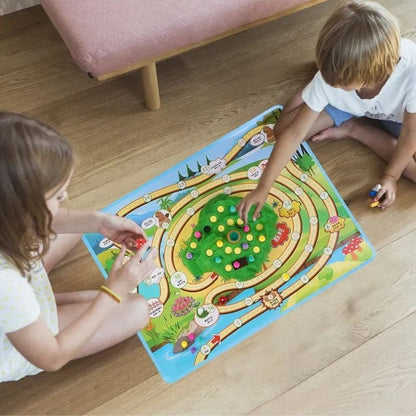 2  enfants jouent à Lapin carotte jeu de société 4 ans excellent jeu familial