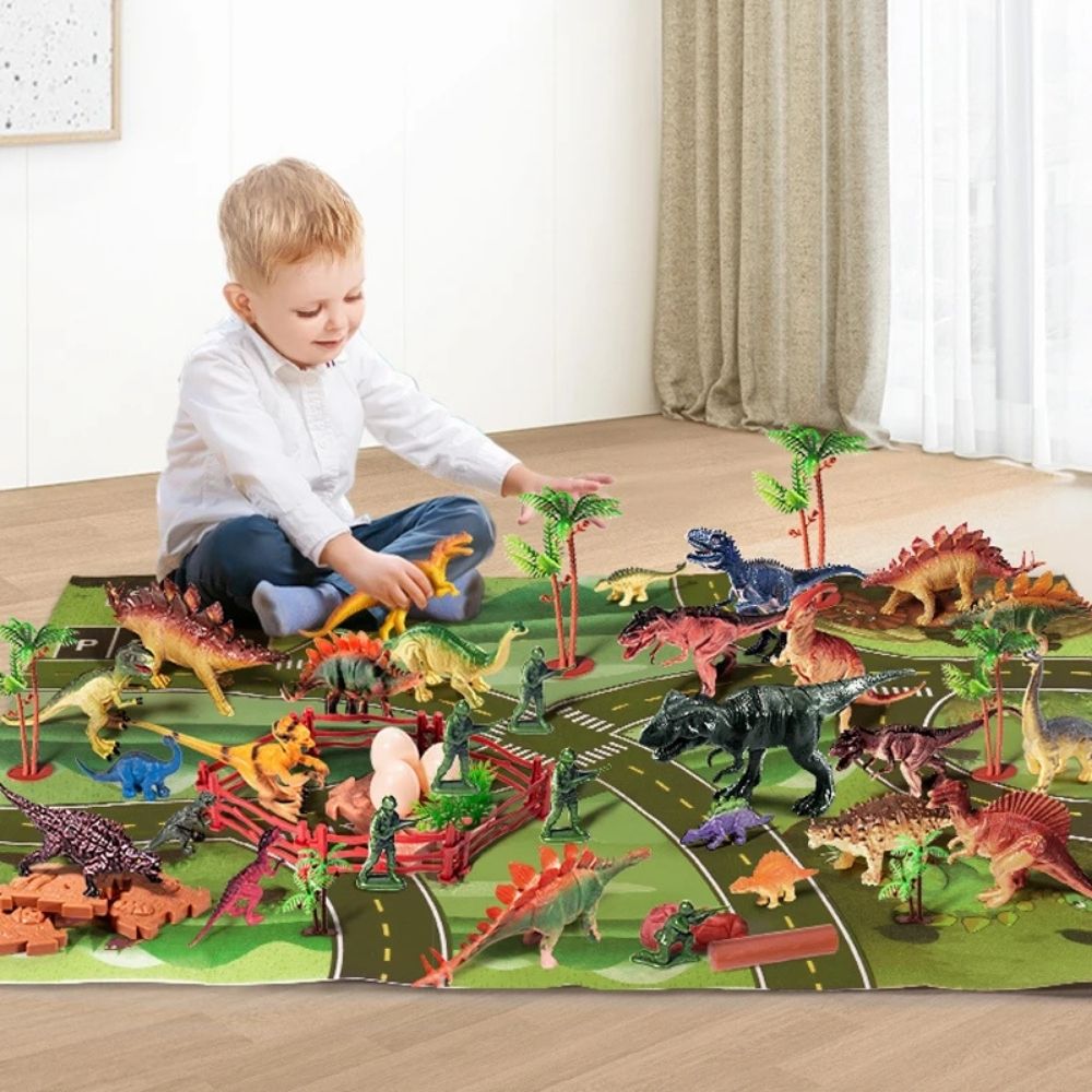 un jeu de dinosaure jouet avec son tapis de jeu et ses figurines