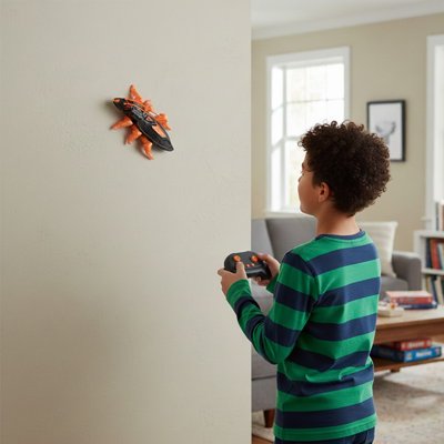 Jouet robot  avec télécommande sans fil un gros cafard noir et orange pour rire entre amis