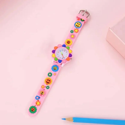 Un bracelet coloré de montre enfant fille rose
