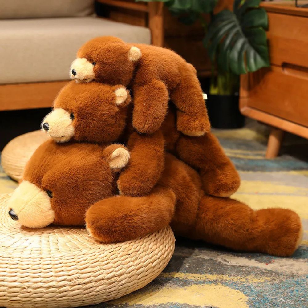 3 ours en peluche bruns tailles différente bras calins