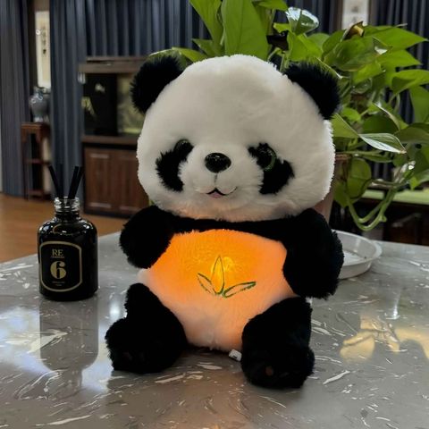 une peluche qui respire modèle Panda joli