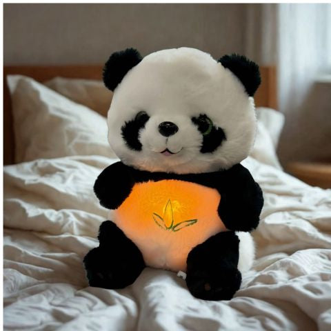 peluche qui respire sur le lit des parents le modèle panda