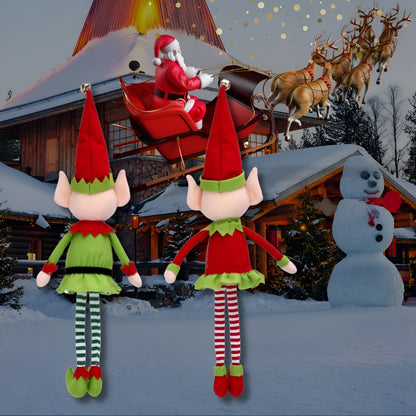 les lutin farceur de dos les poupée sont bien cousue et bien finie on remarque leur qualité exceptionnelle dans un magnifique décor du royaume du Père Noël