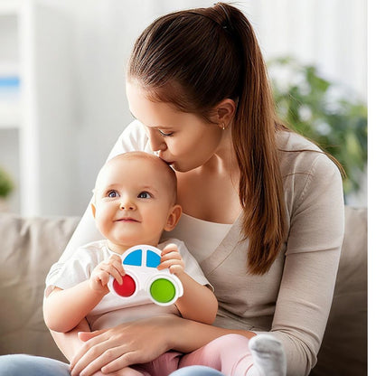 pop it bebe en silicone pour découvertes sensoriel calme le bébé  