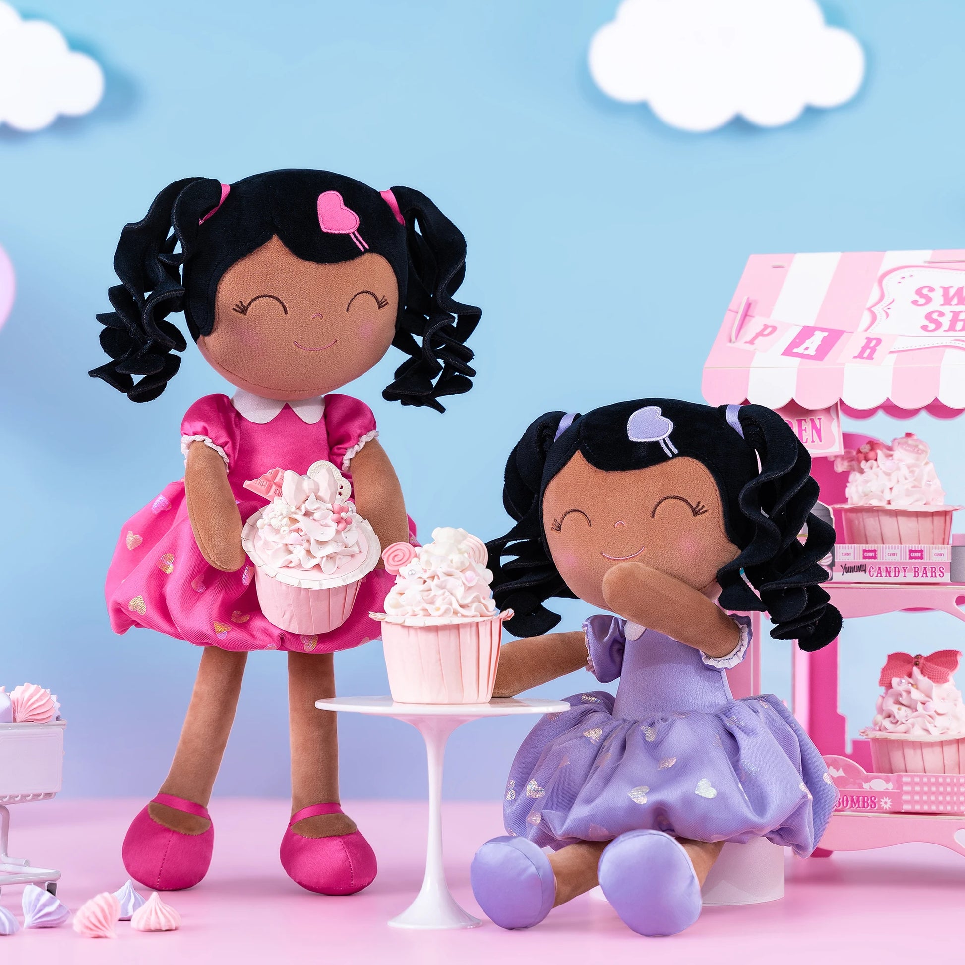 deux poupée pour fillette noires afro descendant robe rose et mauve
