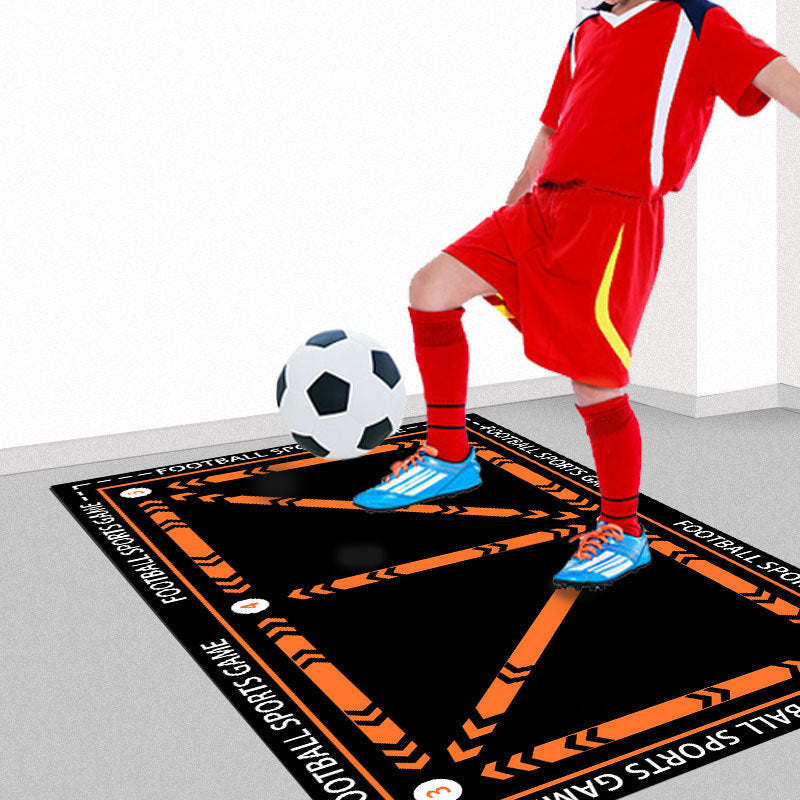 tapis entrainement foot noir avec ligne d'exercice orange fluo